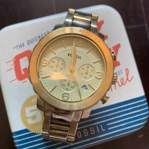 Women’s gold fossil watch